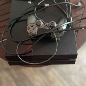 ps4 with controller with games already downloaded on there